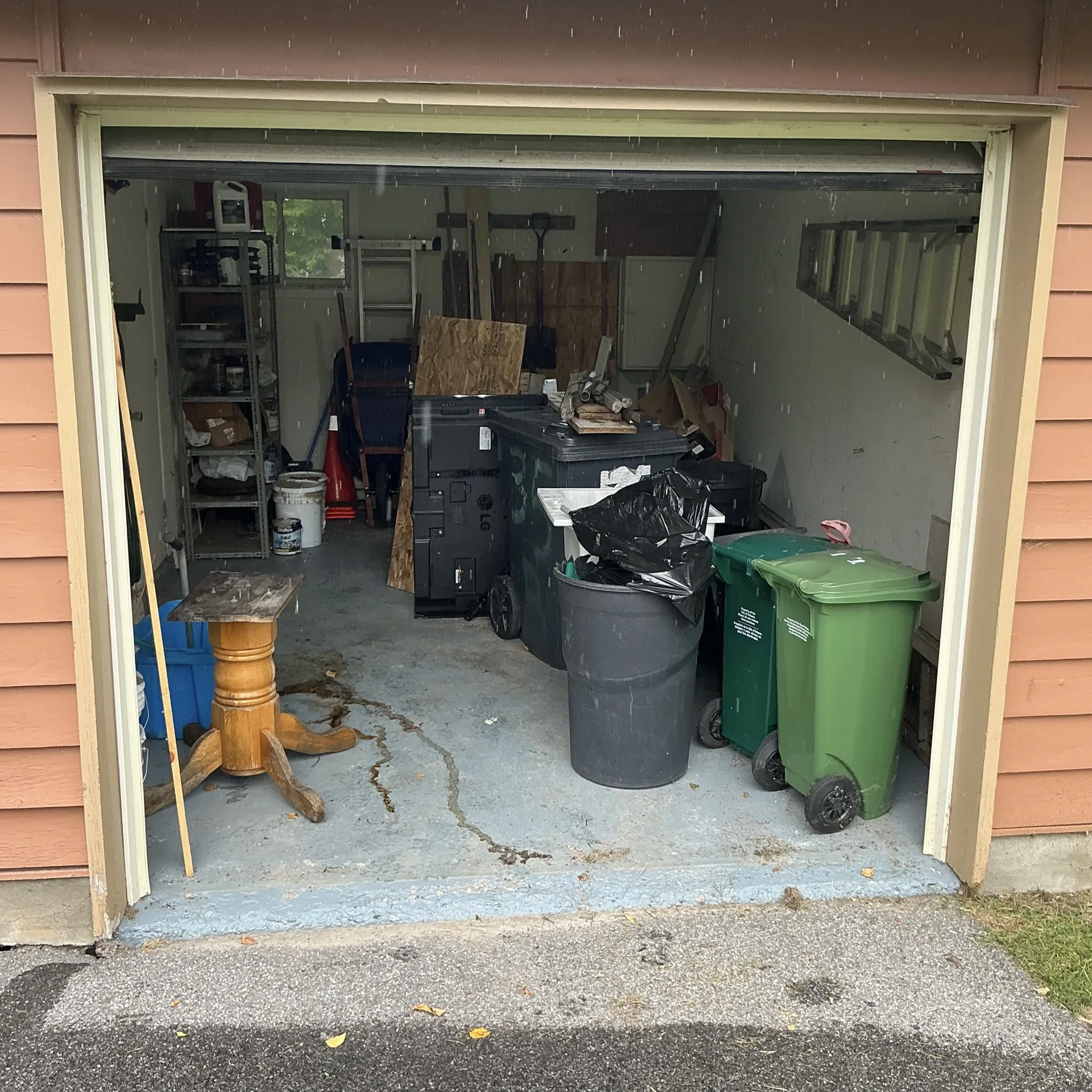 Ottawa waste disposal team clearing an overflowing garage cleanout